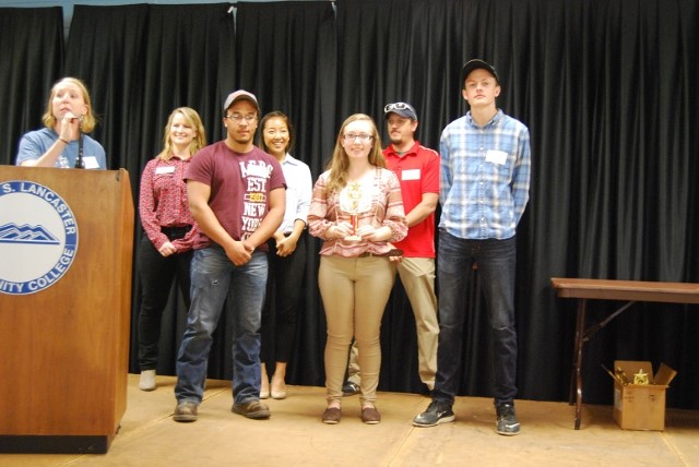 Students accepting a design award for "The Sleeper" turbine for the 2017 KidWind competition at Dabney S Lancaster Community College on April 8, 2017.