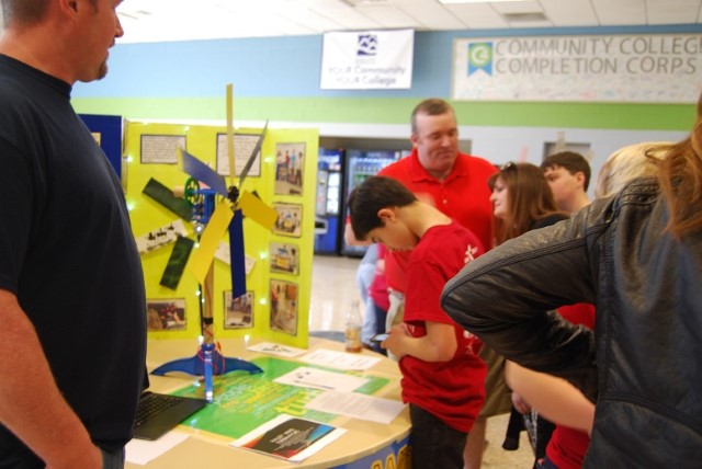 Valley Elementary Wind Turbinators team member checking the table table at the Kidwind competition at Dabney S. Lancaster Community College on April 8, 2017.